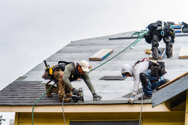 Professional Storm Damage Roof Repair technician working in Amherst, NH